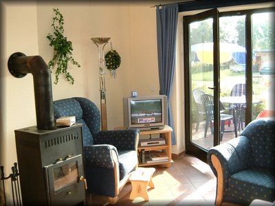 Wohnzimmer mit Kaminofen.JPG